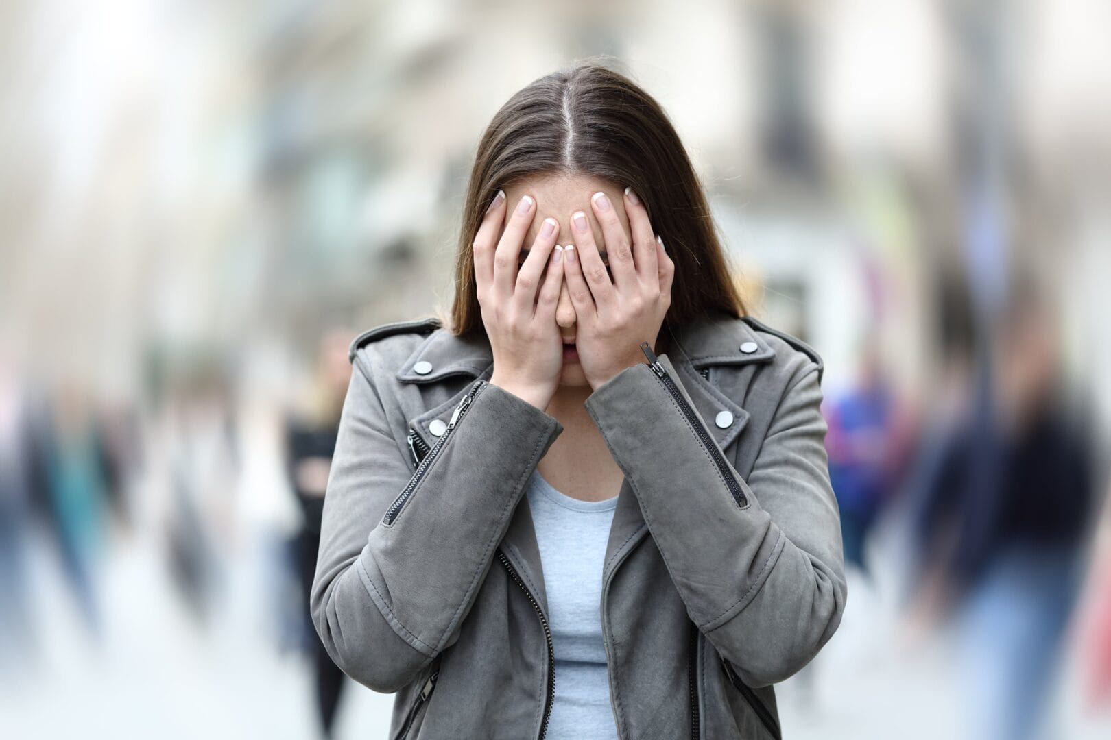 Woman showing the signs of social anxiety disorder